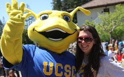 Girl with mascot, Sammy the Slug